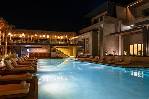 Property building, Patio, Night, Pool view, Swimming pool, sunbed