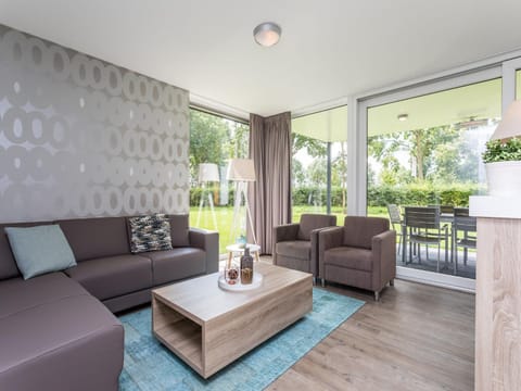 Luxurious wellness villa with a fireplace in Limburg Chalet in Roggel