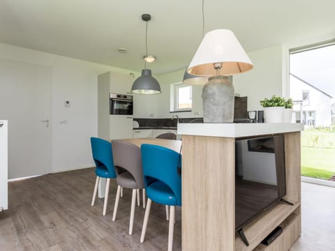 Modern, child-friendly villa with a fireplace in Limburg Chalet in Roggel