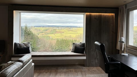 Natural landscape, View (from property/room), Living room, Seating area