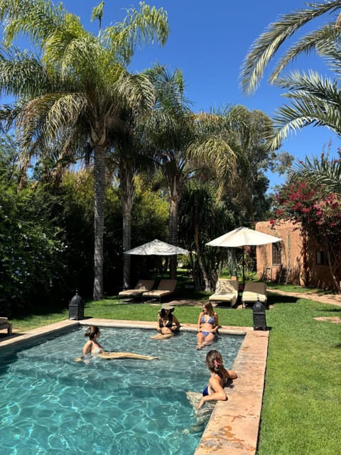 Property building, Day, People, Garden, Pool view, Swimming pool, sunbed