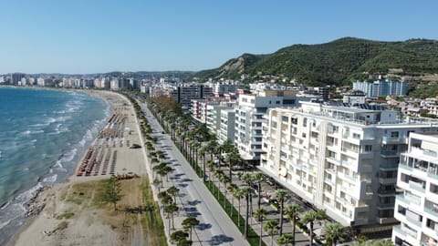 Property building, Nearby landmark, Neighbourhood, Natural landscape, Bird's eye view, Beach, City view, Sea view, Street view, Location