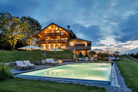 Property building, Facade/entrance, Night, Garden, Swimming pool, Swimming pool, Sunset