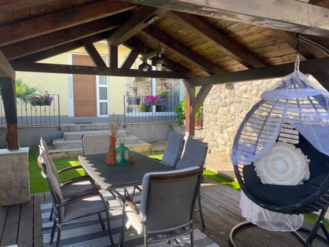 Patio, Day, BBQ facilities, Seating area