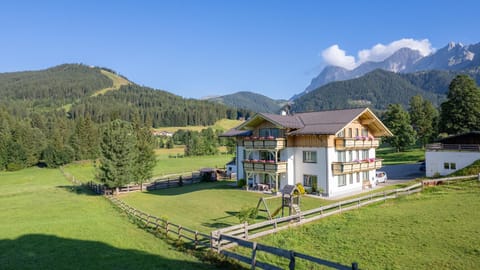 Property building, Natural landscape, Children play ground