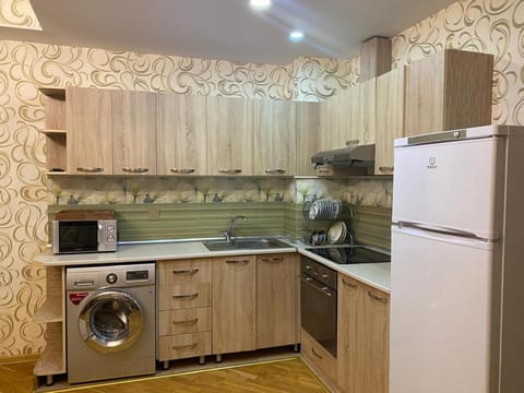 Kitchen or kitchenette, oven