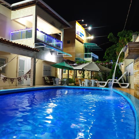 Property building, Night, Swimming pool