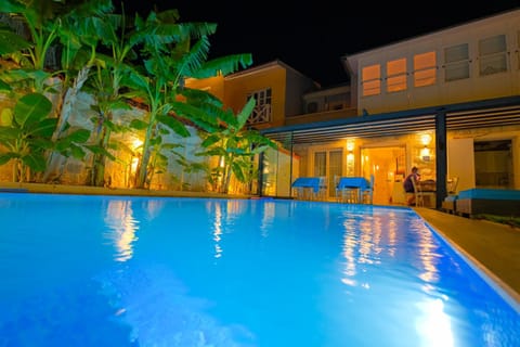 Property building, Night, Pool view, Swimming pool