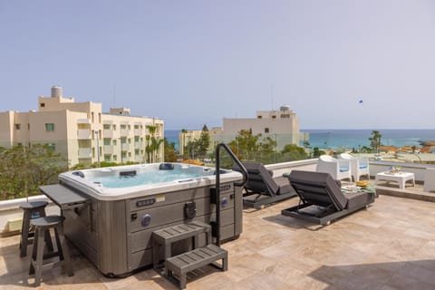 Patio, Communal lounge/ TV room, Day, Natural landscape, Hot Tub, Hot Tub, View (from property/room), Balcony/Terrace, Balcony/Terrace, Beach, Evening entertainment, Pool view, Sea view, Swimming pool, sunbed