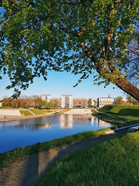 Property building, Nearby landmark, Spring, Day, Natural landscape, Garden, Lake view, River view