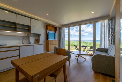 Kitchen or kitchenette, Living room, Dining area, Sea view