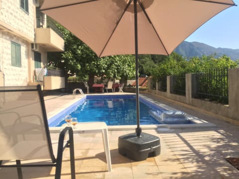 Patio, Day, Mountain view, Pool view, Swimming pool, sunbed