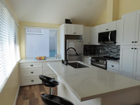 Kitchen or kitchenette, oven, stove