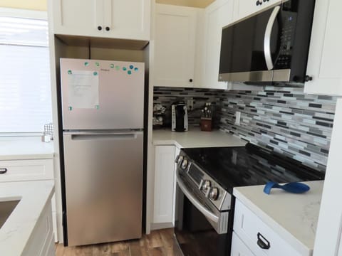 Kitchen or kitchenette, oven, stove