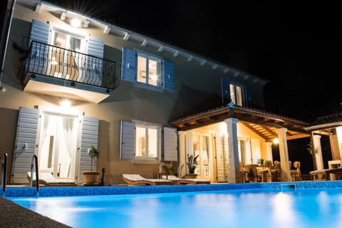 Property building, Night, Pool view, Swimming pool, sunbed