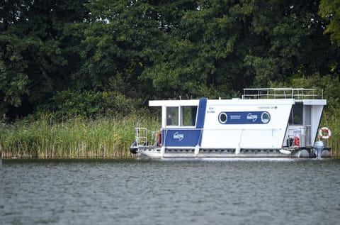 Kuhnle-Tours Hafendorf Müritz Docked boat in Rechlin