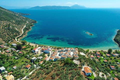 Property building, Nearby landmark, Day, Natural landscape, Bird's eye view, Beach, Beach, Mountain view, Sea view, Swimming pool