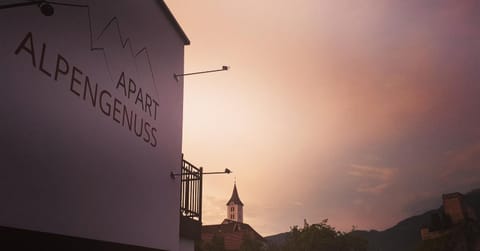 Property building, Nearby landmark, Property logo or sign, Sunset