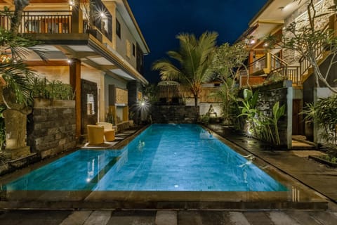 Property building, Patio, Night, Pool view, Swimming pool, sunbed