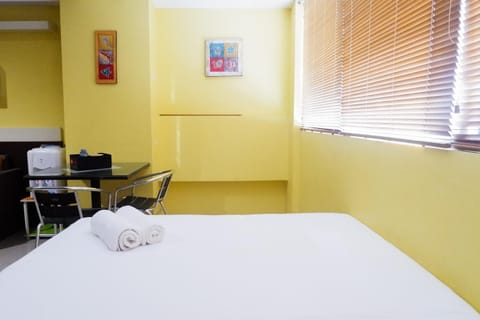 Comfy Studio at High Point Serviced Apartment By Travelio Apartment in Surabaya