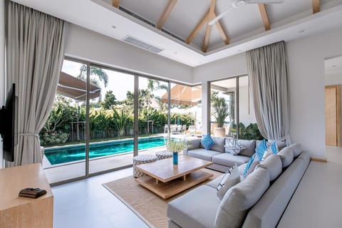 Living room, Seating area, Pool view