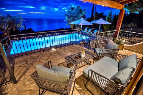 Patio, Night, Natural landscape, Living room, Seating area, Pool view, Swimming pool, sunbed