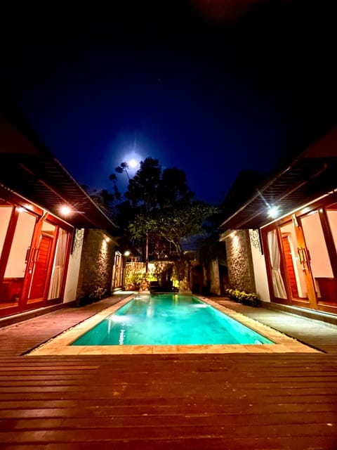 Property building, Night, Pool view, Swimming pool, sunbed