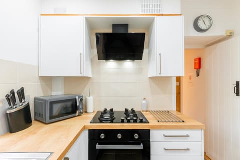 Kitchen or kitchenette, oven, stove