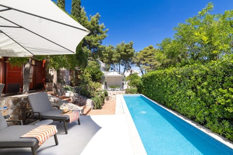 Patio, Seating area, Pool view, Swimming pool, sunbed