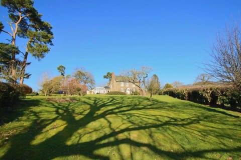 Mid-Wales Farmhouse, swimming pool, tranquil countryside views, sleeps 14 House in Wales