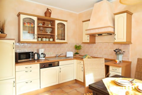 Kitchen or kitchenette, Dining area, dishwasher, oven, stove, toaster