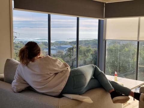 People, Natural landscape, View (from property/room), Living room, Seating area, Sea view