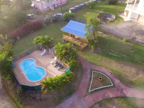 Maison d'une chambre avec vue sur la mer piscine partagee et jardin a Bouillante a 1 km de la plage House in Bouillante