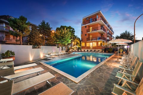 Property building, Swimming pool, Sunset