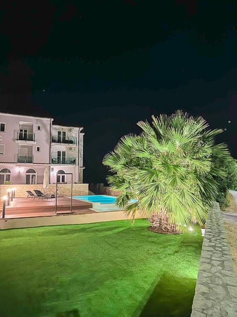 Property building, Night, Natural landscape, Garden, Garden view, Pool view, Swimming pool