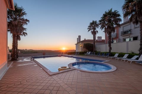 Property building, Swimming pool, Sunset