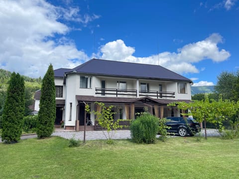 Property building, Day, Natural landscape, Parking