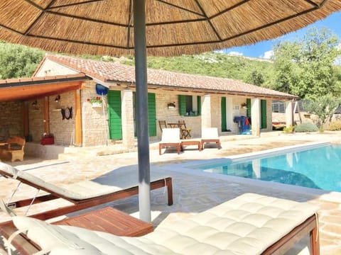 Facade/entrance, Neighbourhood, Pool view