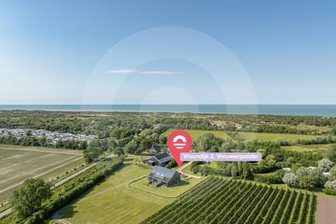 Welcome in - Vakantiehuis Zeepeertje met ruime tuin I Vroondijk 2 Vrouwenpolder Apartment in Vrouwenpolder