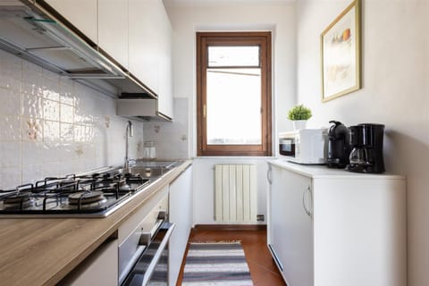 Kitchen or kitchenette, stove