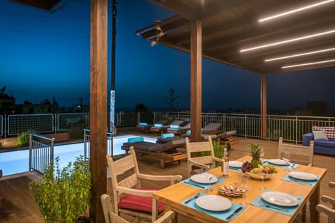 Patio, Night, View (from property/room), Dining area, Pool view, Swimming pool