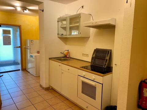 Kitchen or kitchenette, stove, kitchen