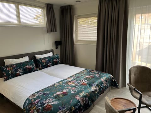 Luxe kamer Chambre Renard met eigen terras Bed and Breakfast in Zoutelande