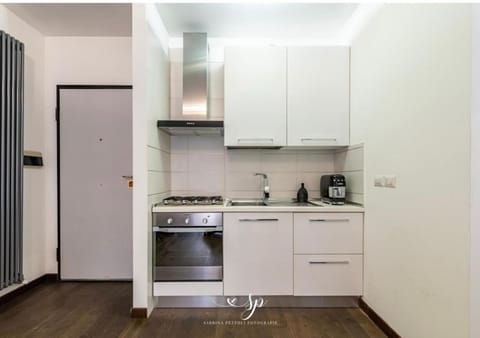 Kitchen or kitchenette, oven, stove