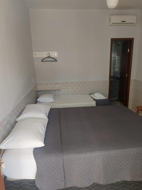 Bed, Photo of the whole room, Bedroom, towels, air conditioner