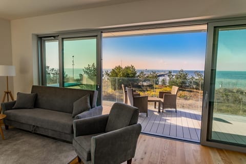 Living room, Seating area, Garden view, Sea view