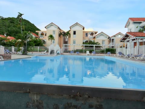 Appartement d'une chambre avec piscine partagee jardin clos et wifi a Sainte Anne a 1 km de la plage Condo in Sainte-Anne