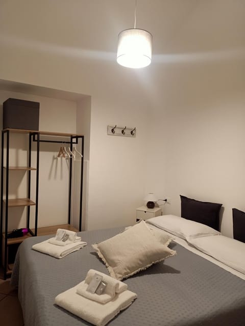 Bed, Photo of the whole room, Bedroom, towels, wardrobe