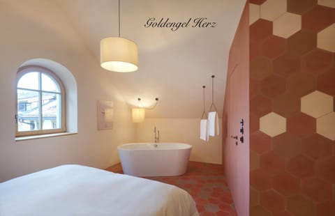Goldengel Design - Suiten im historischen Ortskern von Kaltern Eigentumswohnung in Kaltern an der Weinstraße