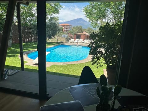 Patio, Day, Garden, Garden view, Mountain view, Pool view, Swimming pool, sunbed